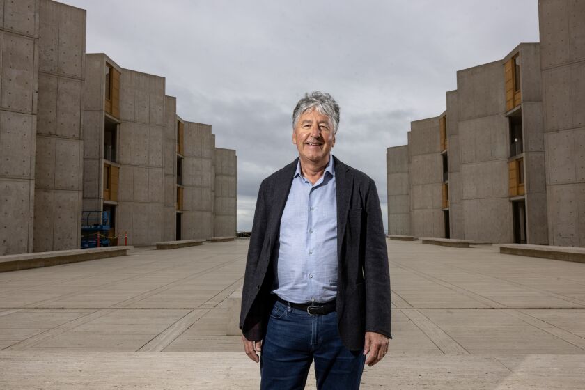 SAN DIEGO, CA - FEBRUARY 24, 2023: Professor and Chief Science Officer for the Salk Institute, Gerald Joyce, PhD, who will soon become president of the Salk Institute, stands at the Salk Institute's courtyard in La Jolla on Friday, February 24, 2023. (Hayne Palmour IV / For The San Diego Union-Tribune)