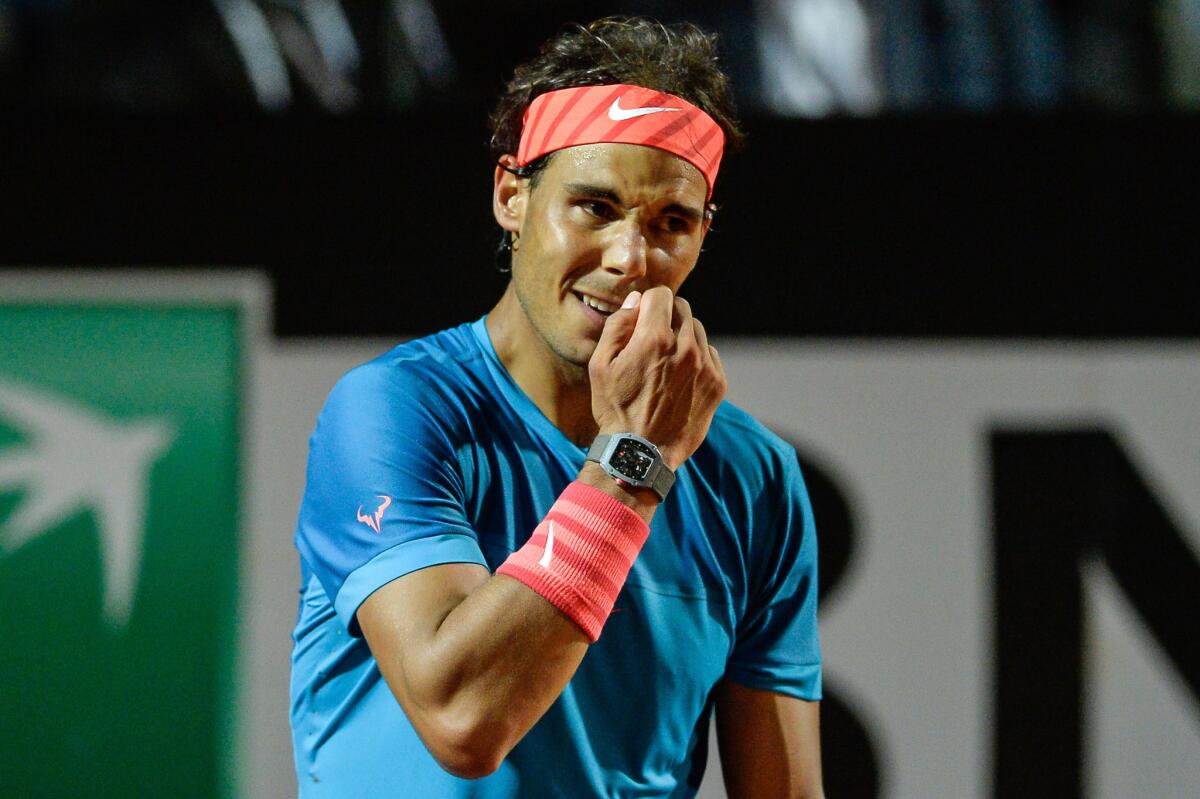 Rafael Nadal reacts after losing a point against Stan Wawrinka in a quarterfinal match at the Italian Open on Friday.