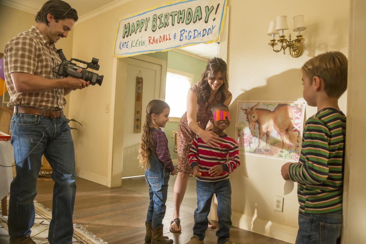 Milo Ventimiglia and Mandy Moore in NBC's popular family drama "This Is Us," whose fall premiere is delayed to November.