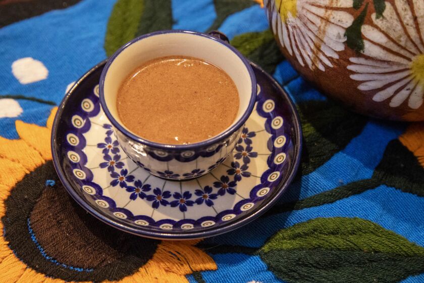 A cup of champurrado is served at chef Wes Avila's home.