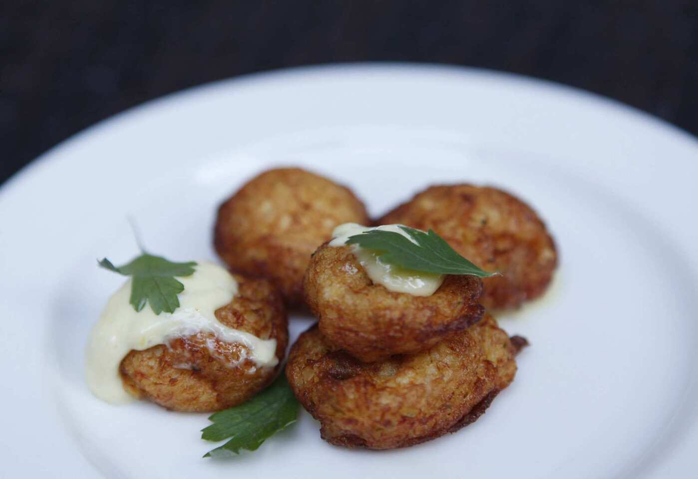 The soldaditos de pavia is a small-plate of salt cod fritters with lemon cream.