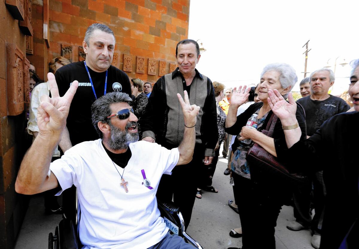 Agasi Vartanyan greets a crowd of supporters Thursday in Burbank after leaving the glass enclosure he had been living in during his 55-day fast.