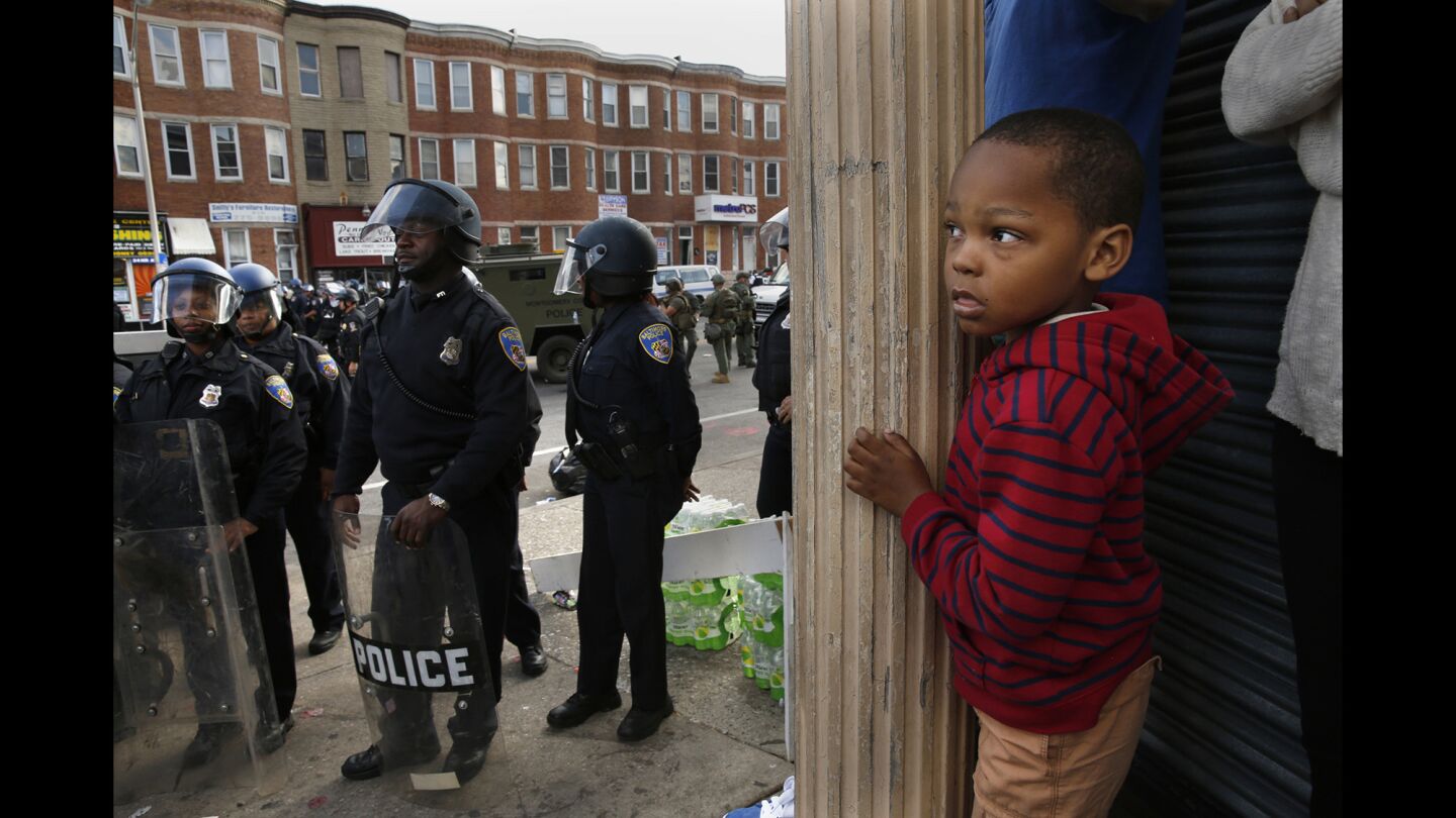 Jayden Thorpe, 5, came with his mother to watch what was happening at West North and Pennsylvania avenues in Baltimore.