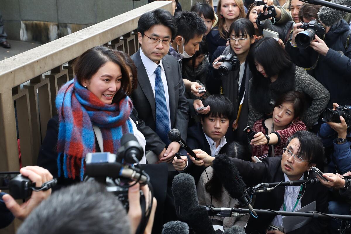 Freelance journalist Shiori Ito fields media questions after Wednesday's ruling in Tokyo. A court ordered former television newsman Noriyuki Yamaguchi to pay $30,150 to Ito for physical and psychological pain resulting from his alleged sexual assault.