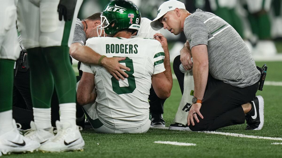 Aaron Rodgers injures his left Achilles tendon in his first series for the  Jets - The San Diego Union-Tribune