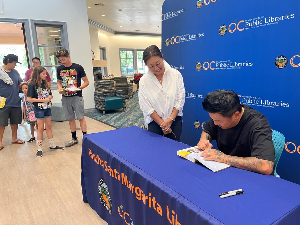 Roy Choi signed copies of his best-selling cookbook and memoir, “L.A. Son."