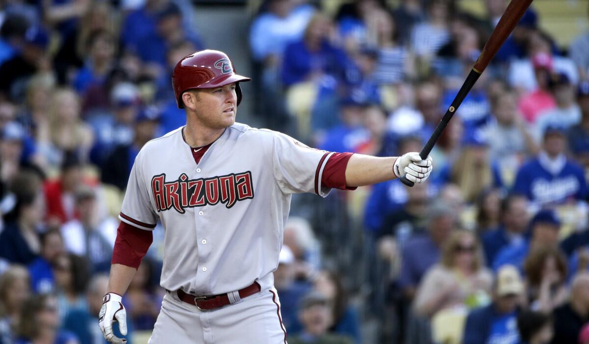 Diamondbacks slugger Mark Trumbo steps into the batter's box during a game against the Dodgers on Saturday.