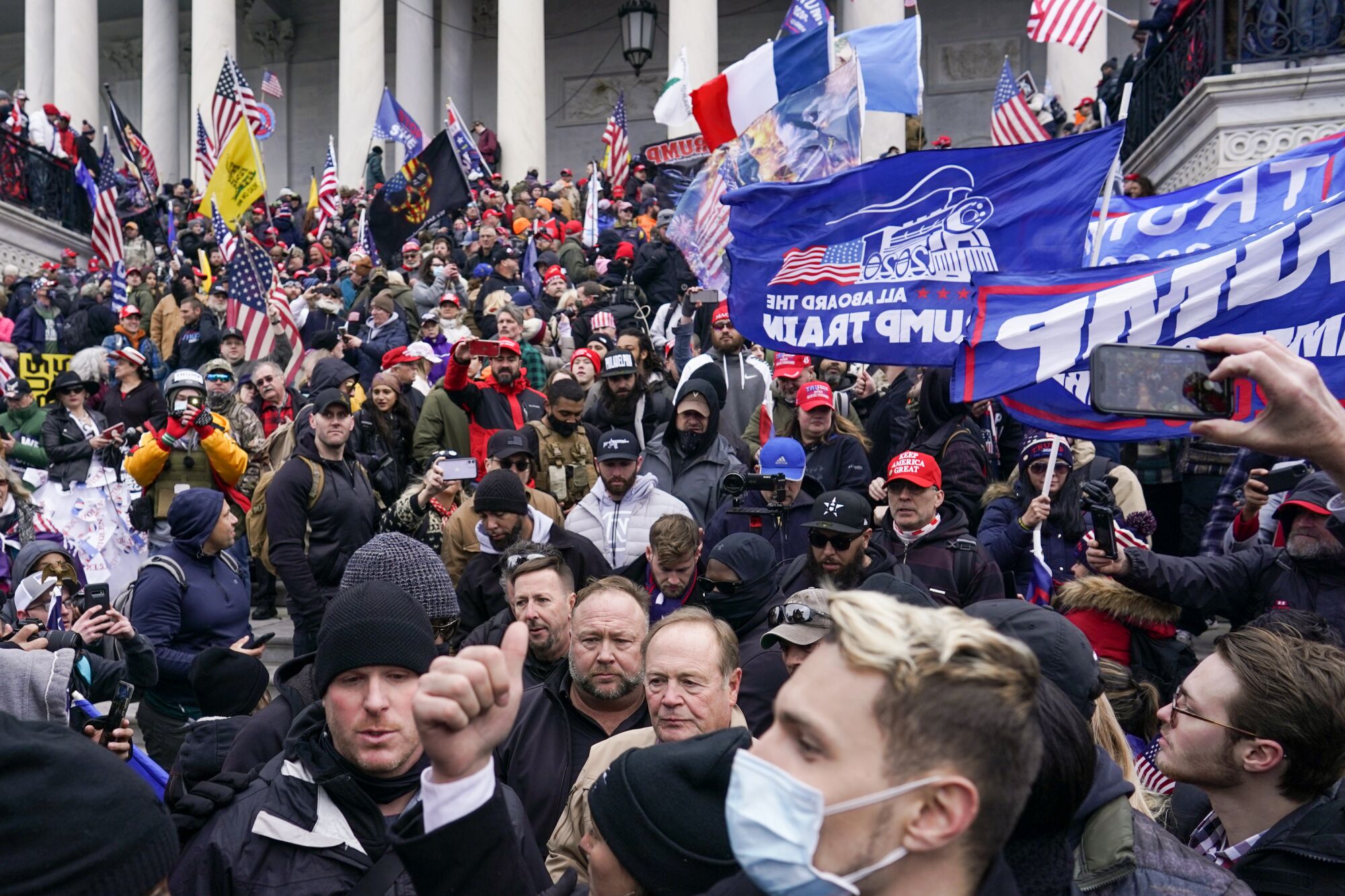 Supporters of President Trump fill the steps of the U.S. Capitol before a mob stormed the building.