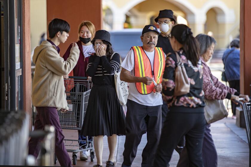 SAN GABRIEL, CA - JANUARY 29, 2020: Some residents wear masks in precaution of the coronavirus while shopping at Ranch Market on January 29, 2020 in San Gabriel, California.(Gina Ferazzi/Los AngelesTimes)