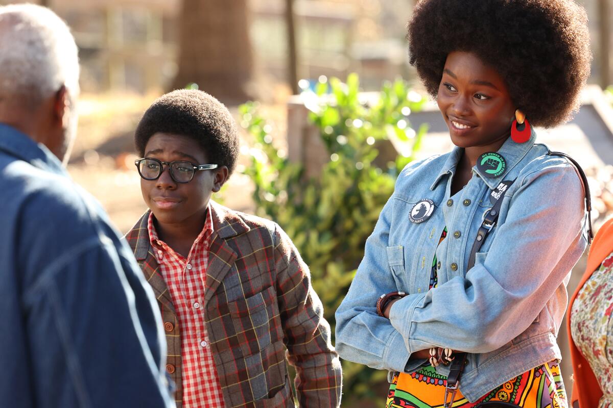 Two young people share a smile in a scene from "The Wonder Years" on ABC.