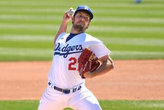GLENDALE, ARIZONA MARCH 1, 2021-Dodgers pitcher Trevor Bauer throws.