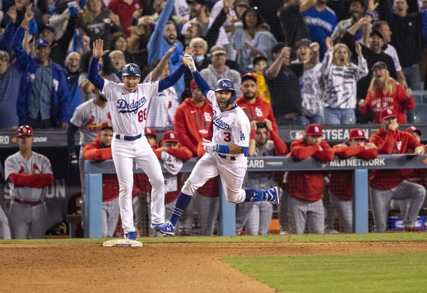 Los Angeles Dodgers left fielder Chris Taylor reacts while running the bases after his two-run home run