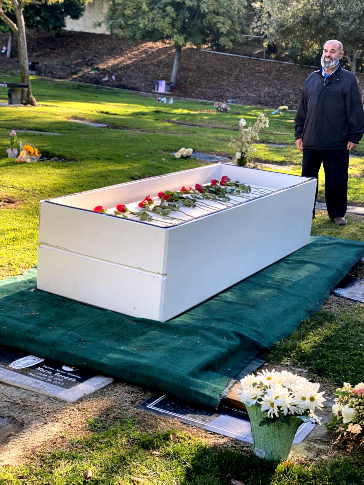 Hashem Ahmad Alshilleh oversees a burial.