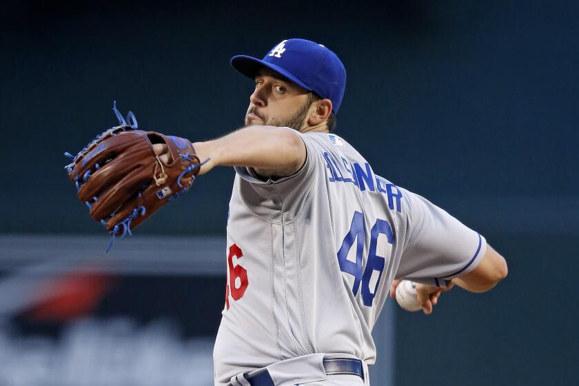 Los Angeles Dodgers' Mike Bolsinger throws a pitch against the Arizona Diamondbacks during the first inning of a baseball game Monday, June 13, 2016, in Phoenix. The Diamondbacks defeated the Dodgers 3-2. (AP Photo/Ross D. Franklin)
