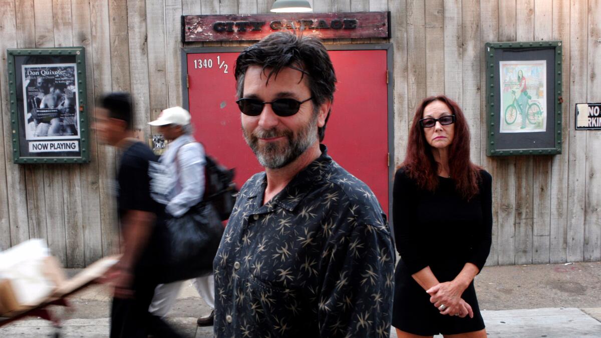 Charles Duncombe, center, of City Garage in Santa Monica, stands with artistic director and wife Frederique Michel.