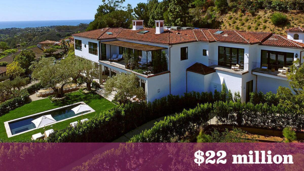 The 12,000-square-foot spec house built on the site of Ronald and Nancy Reagan's onetime home in Pacific Palisades has sold for $22 million.