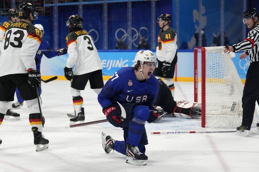 United States' Matt Knies celebrates a goal during a preliminary round men's hockey game against Germany at the 2022 Winter Olympics, Sunday, Feb. 13, 2022, in Beijing. (AP Photo/Petr David Josek)
