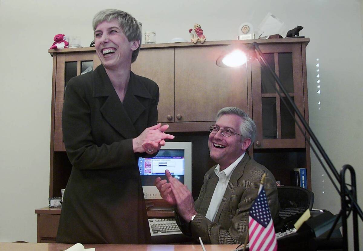 In this photo from 2002, Wendy Greuel and her future husband, Dean Schramm, react in her office at DreamWorks SKG after learning that she had won the runoff election for the 2nd District seat on the L.A. City Council. As a candidate for mayor, Greuel ofen refers to her time as a high-ranking executive at the studio.