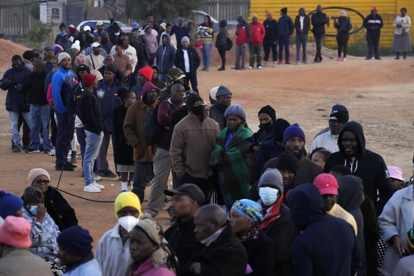 Voters line up to cast their ballot for general elections in Alexandra, near Johannesburg, South Africa, Wednesday, May 29, 2024. South Africans began voting Wednesday in an election seen as their country’s most important in 30 years, and one that could put their young democracy in unknown territory. (AP Photo/Themba Hadebe)