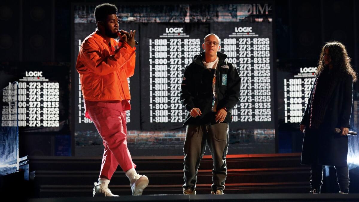 Rehearsing for Sunday's Grammys, from left, Khalid, Logic, and Alessia Cara, who will perform Logic's "1-800-273-8255."