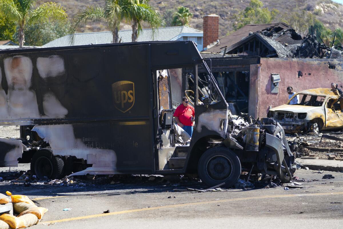 Ocean Beach resident Steve Krueger's UPS delivery truck after it was hit by a crashing plane in Santee in October 2021