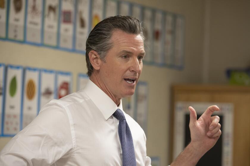 North Hollywood, CA - December 09, 2021: Gov. Gavin Newsom addresses the media inside a classroom at Arminta Elementary School in North Hollywood about his new kid's book about dyslexia and his struggles with it. (Mel Melcon / Los Angeles Times)