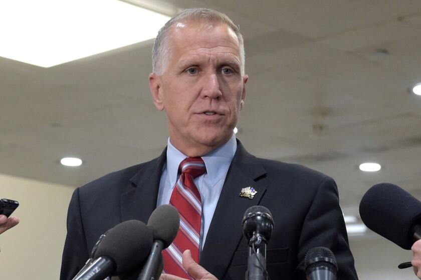 FILE - In this April 7, 2017 file photo, Sen. Thom Tillis, R-N.C., speaks to reporters on Capitol Hill in Washington. Tillis collapsed Wednesday, May 17, 2017, during Washington race, received CPR, as was taken away in ambulance. (AP Photo/Susan Walsh, File)