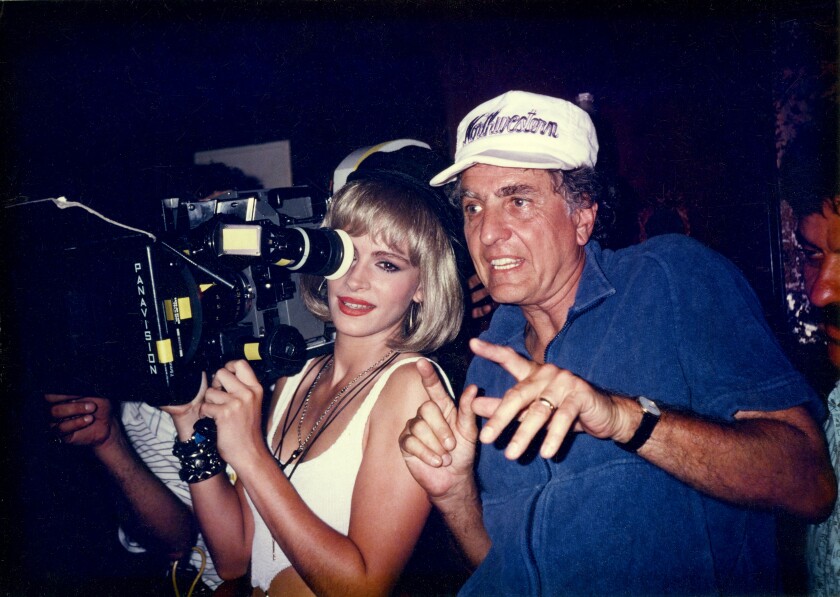 Director Garry Marshall with Julia Roberts, in costume for their film "Pretty Woman."