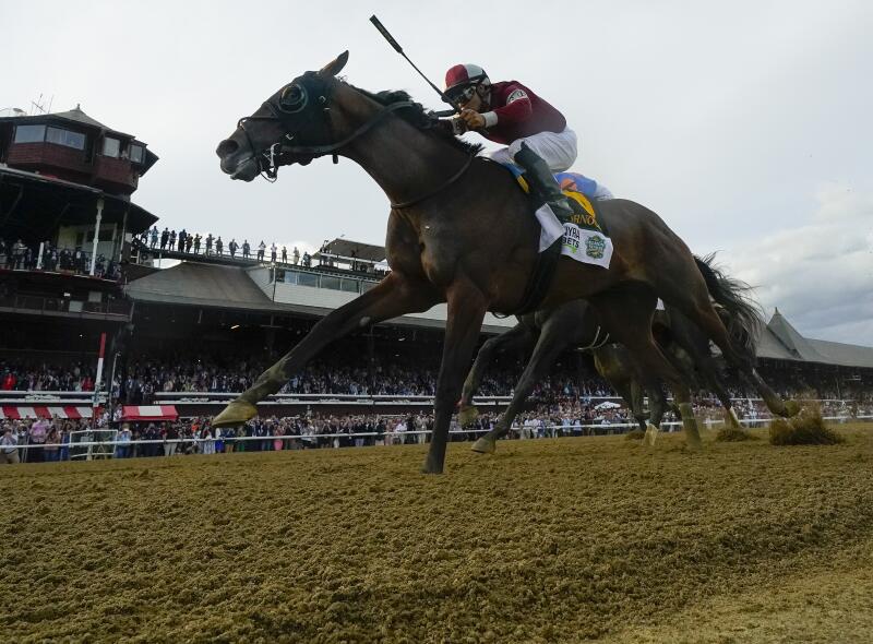 Dornoch races across the finish line to win the Belmont Stakes.