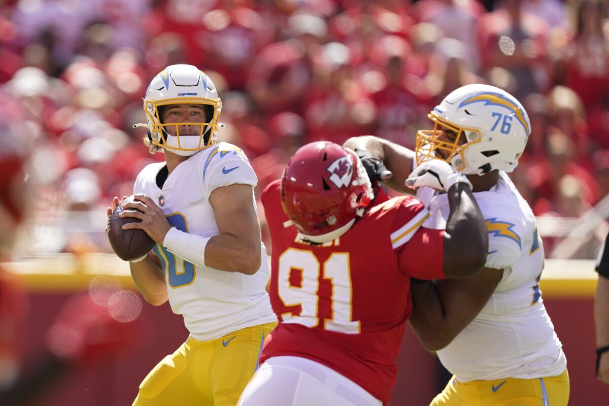 Chargers quarterback Justin Herbert readies to throw during the first half against the Chiefs.