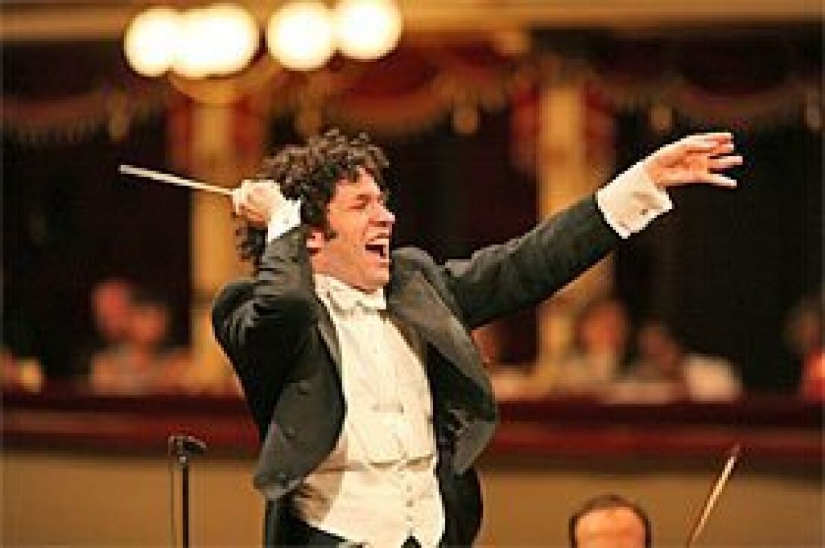 The high-energy Gustavo Dudamel will replace Esa-Pekka Salonen as music director of the Los Angeles Philharmonic next year. - SILVIA LELLI