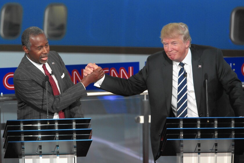 Among GOP-leaning registered voters surveyed by the USC Dornsife/L.A. Times poll, Donald Trump, right, is the front-runner with 25%, but Ben Carson is closely trailing. In California, they're virtually tied.