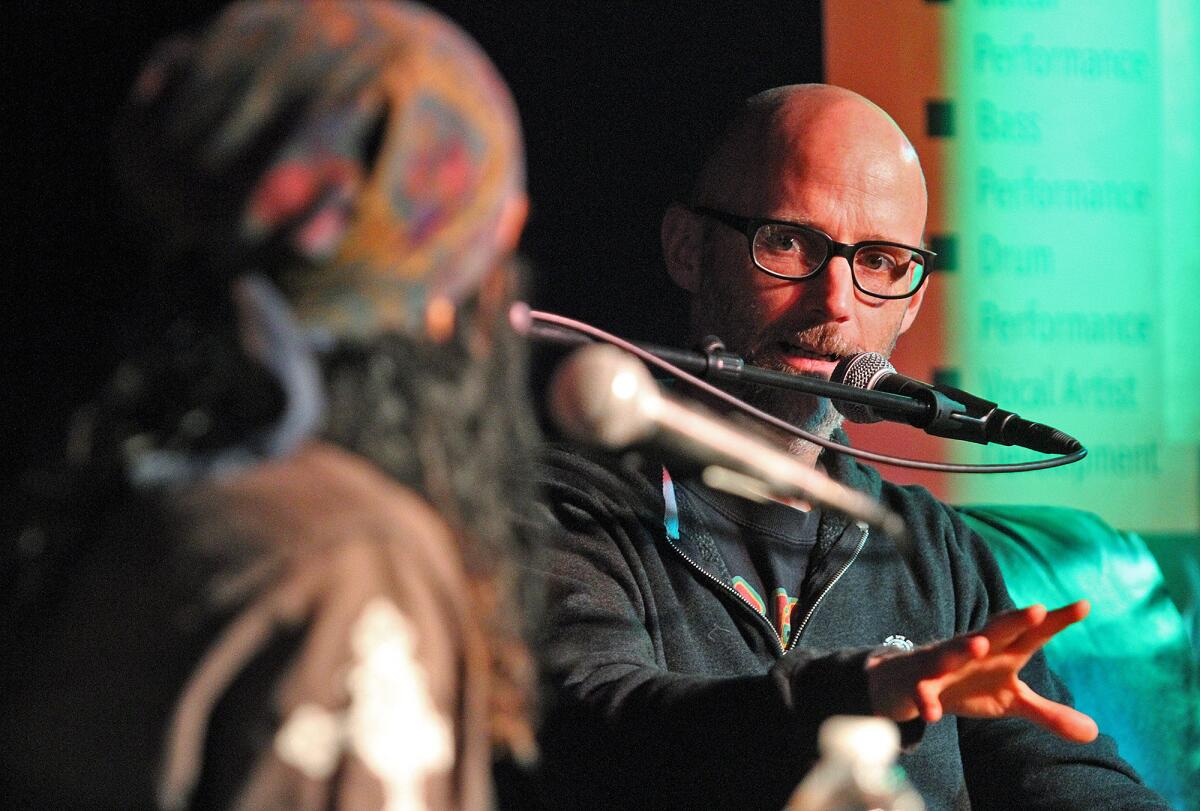 Moby answers a question posed by Native Wayne Jobson at Los Angeles Music Academy in Pasadena during an interview with the popular musician on Wednesday, Jan. 15, 2014. Moby, is an American singer-songwriter, musician, DJ and photographer. He is well known for his electronic music.