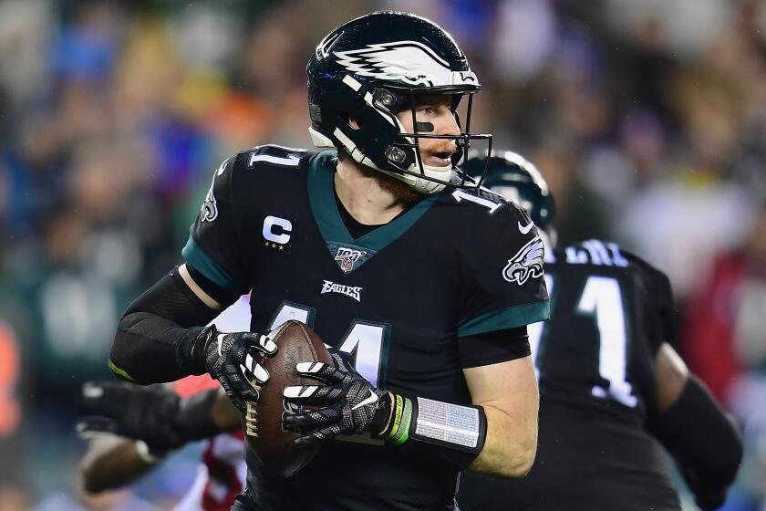 PHILADELPHIA, PENNSYLVANIA - DECEMBER 09: Quarterback Carson Wentz #11 of the Philadelphia Eagles drops back to pass against the defense of the New York Giants during the game at Lincoln Financial Field on December 09, 2019 in Philadelphia, Pennsylvania. (Photo by Emilee Chinn/Getty Images)