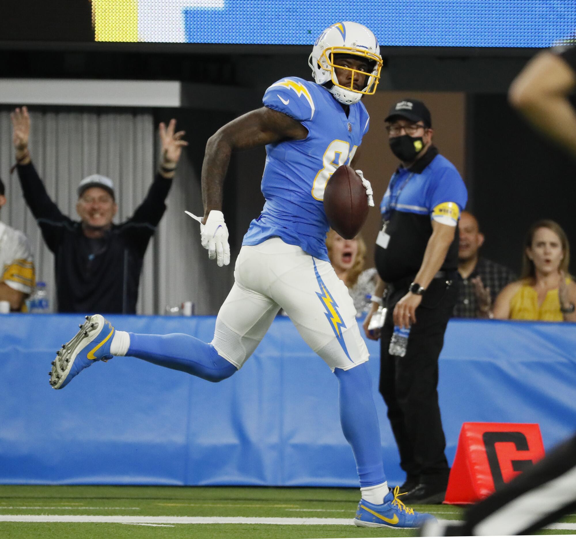 Chargers wide receiver Mike Williams runs into the end zone on a 53-yard touchdown pass from quarterback Justin Herbert.