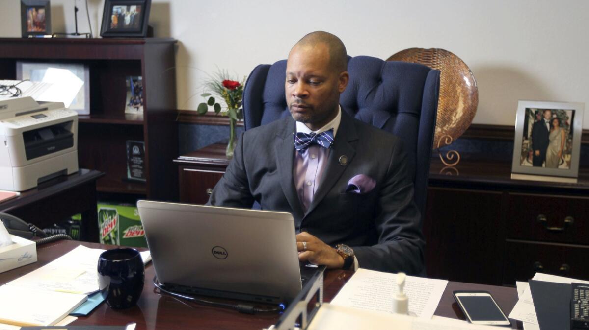 Aaron Ford, who will take office as Nevada's attorney general next month, plans to work with the FBI to enforce a gun background check law.