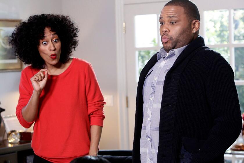 In this image released by ABC, Tracee Ellis Ross, left, and Anthony Anderson appear in a scene from "Black-ish." The series was nominated for a Golden Globe award for best TV musical or comedy on Monday, Dec. 12, 2016. The 74th Golden Globe Awards ceremony will be broadcast on Jan. 8, on NBC. Ross and Anderson also received nominations for best actress and actor in a comedy series. (Nicole Wilder/ABC via AP)