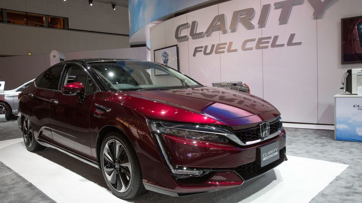 GM and Honda will pool their resources to build hydrogen fuel cell systems to power vehicles like Honda's Clarity.
