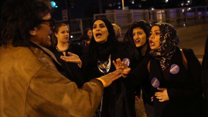 Donald Trump supporters and protesters clash March 11, 2016, outside the UIC Pavilion after the rally for the Republican presidential candidate was canceled.