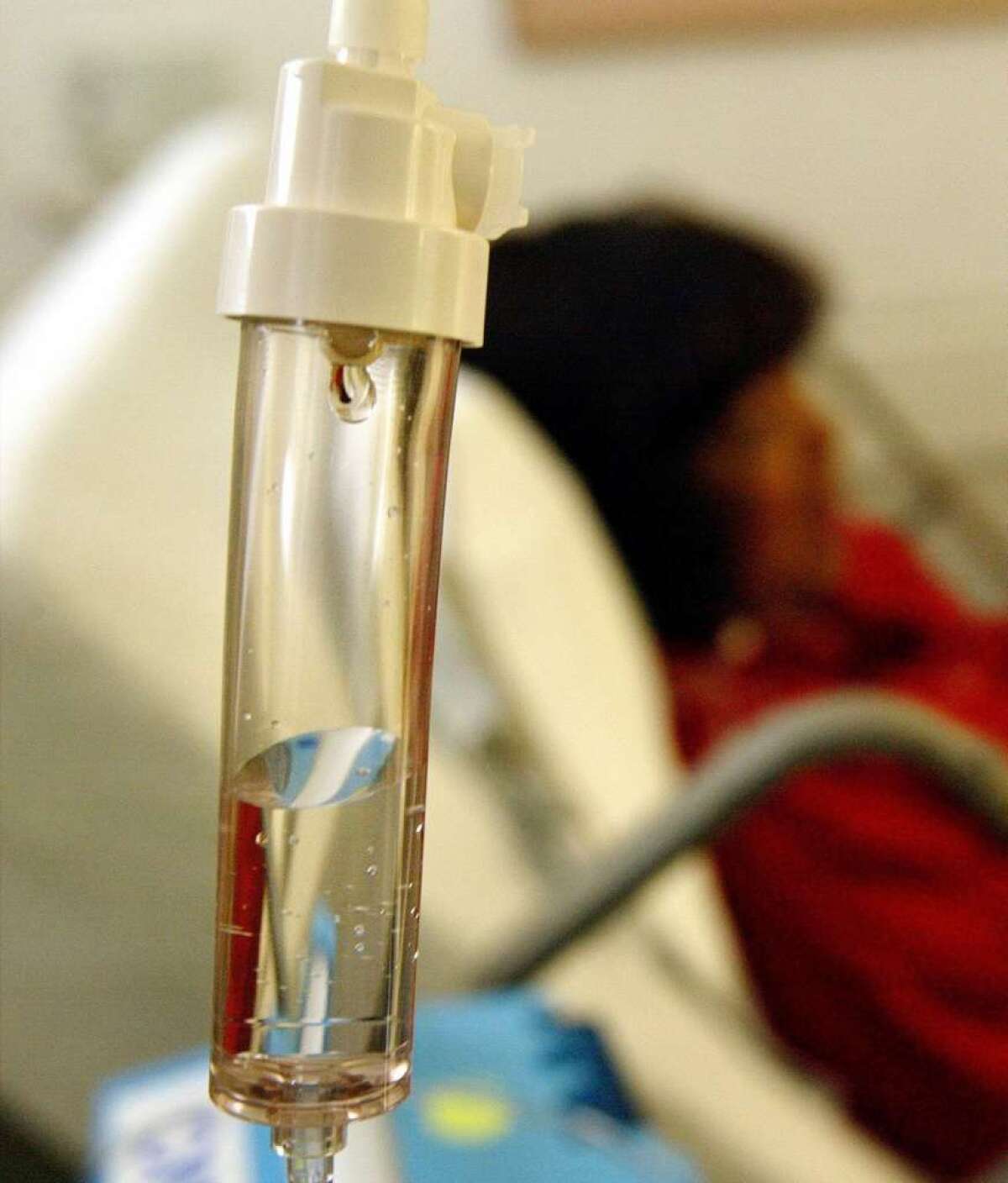 A breast cancer patient receives chemotherapy