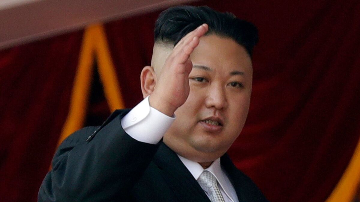 Leader Kim Jong Un waves during a military parade on April 15, 2017, in Pyongyang, North Korea.