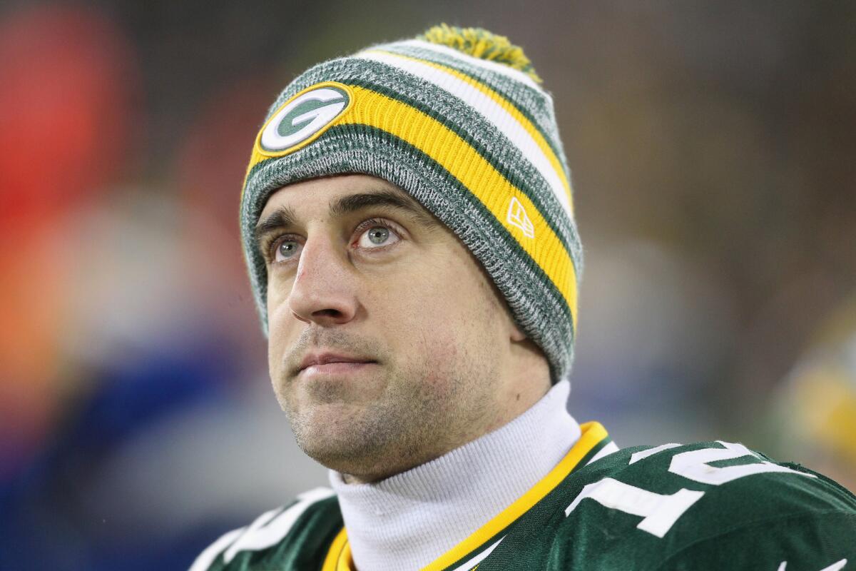 Green Bay quarterback Aaron Rodgers looks on during the Packers' season finale against the Detroit Lions on Dec. 28.