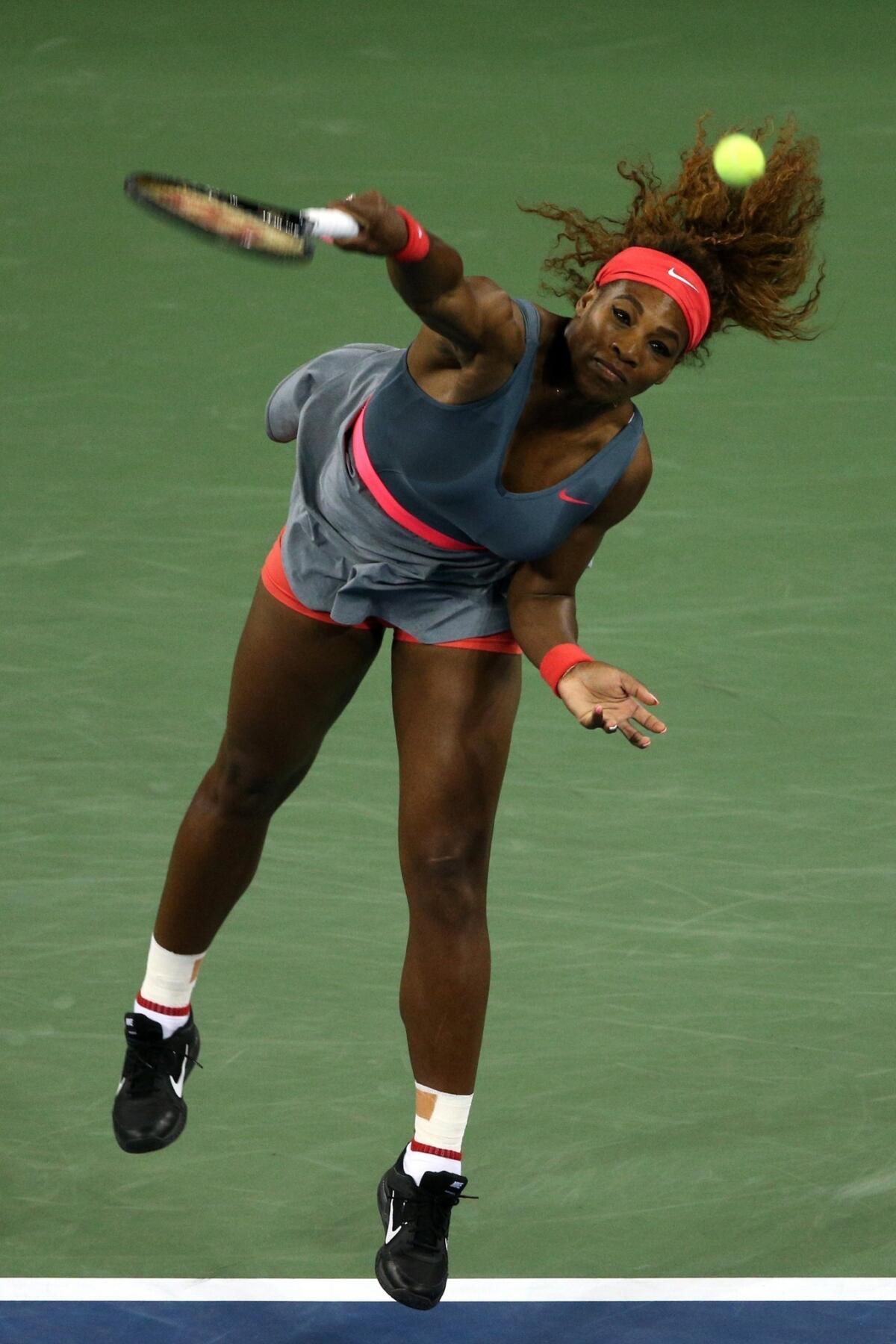 Serena Williams serves during her quarterfinal victory over Carl Suarez Navarro at the U.S. Open on Tuesday.