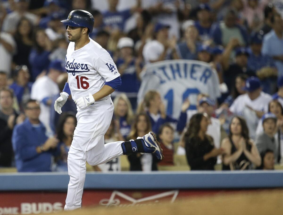 Dodgers center fielder Andre Ethier rounds the bases after hitting a home run against the Arizona Diamondbacks on Monday.