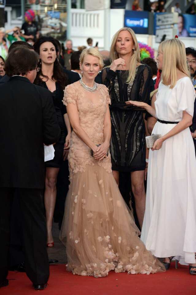 Actress Naomi Watts (C) attends the "Madagascar 3: Europe's Most Wanted" Premiere during the 65th Annual Cannes Film Festival at Palais des Festivals on May 18, 2012 in Cannes, France. Watts chose a nude-colored, beaded Marchesa gown.