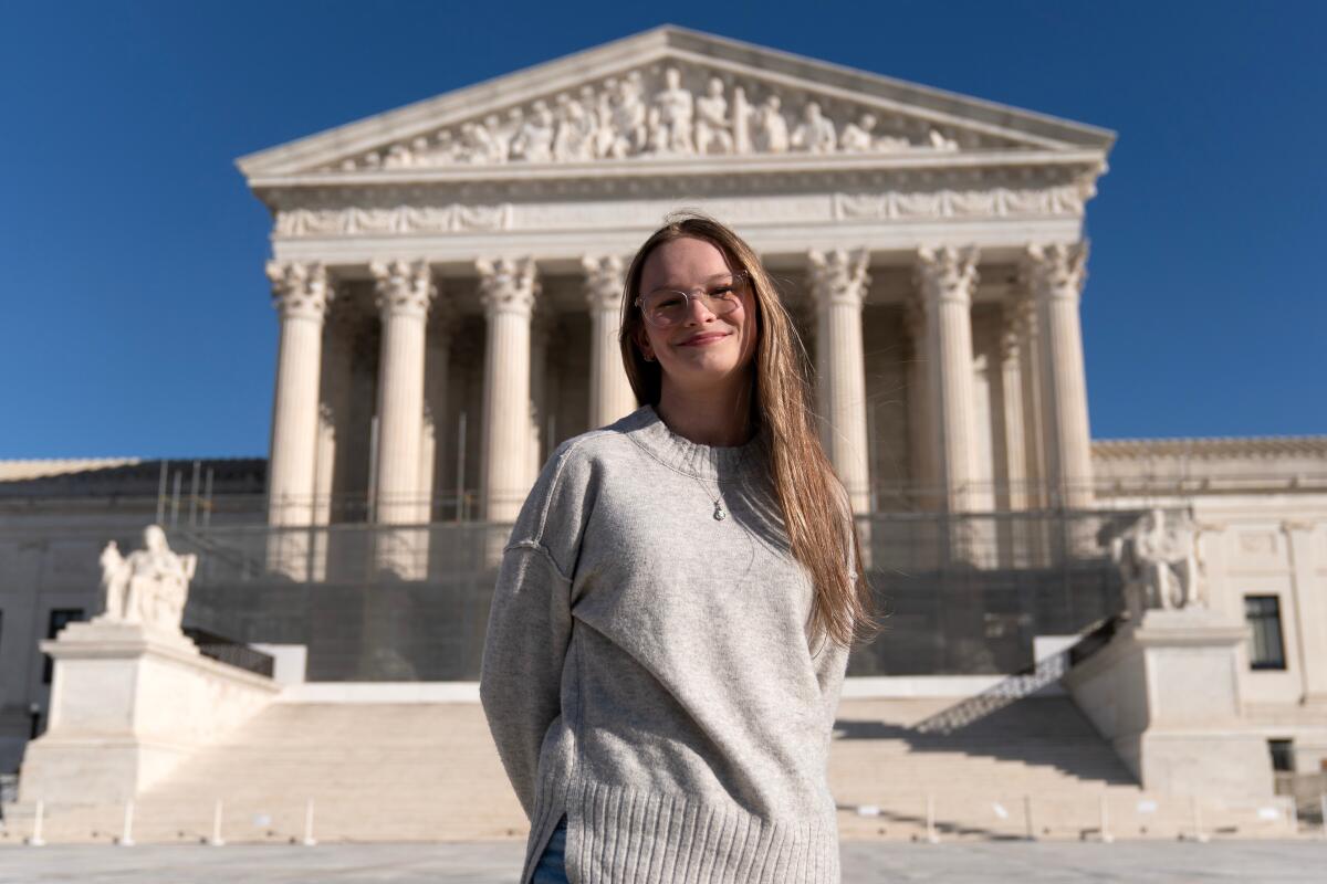 Becky Pepper-Jackson, 15, stands outside the Supreme Court.