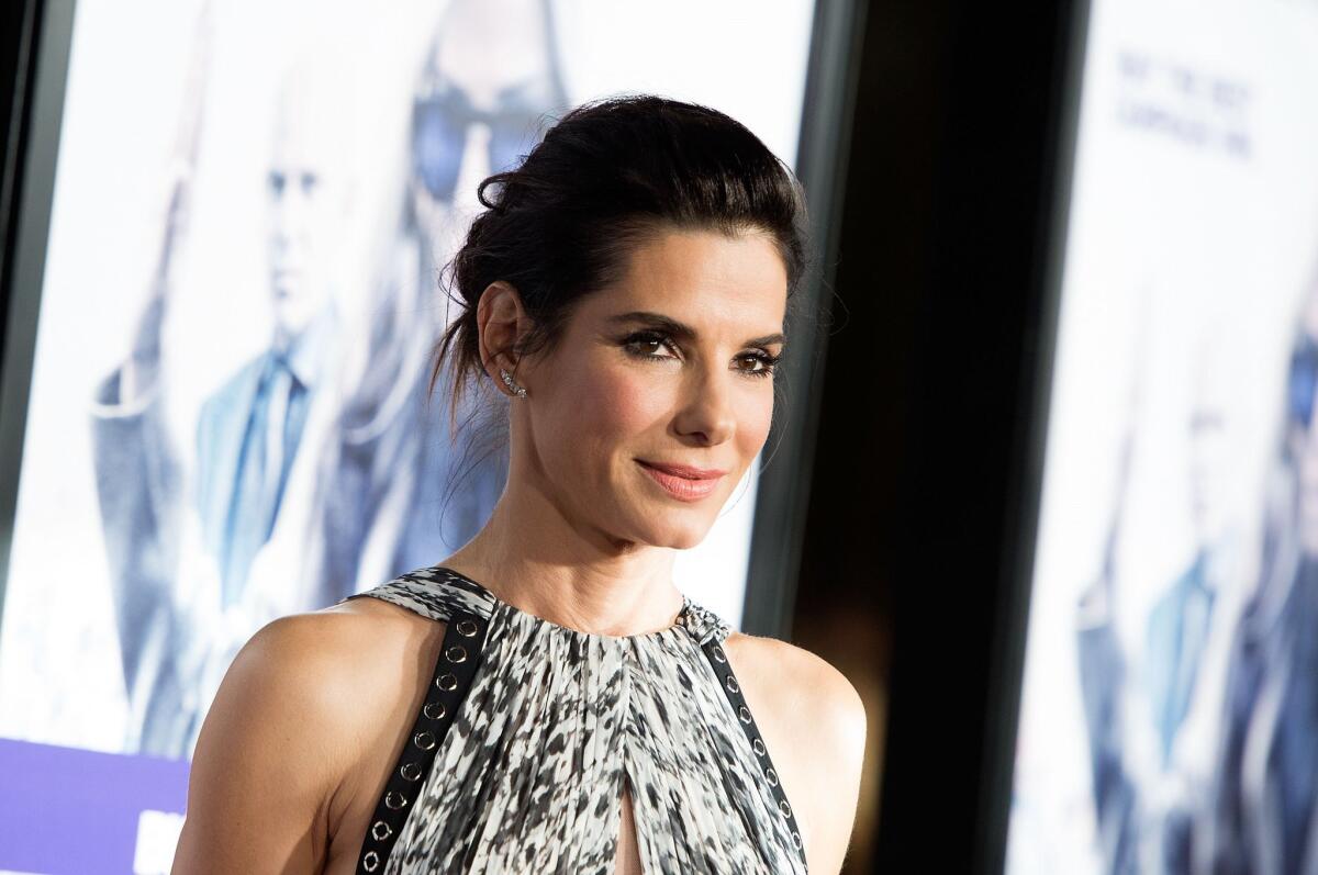 Sandra Bullock, photographed here at the "Our Brand is Crisis" premiere in Hollywood on Oct. 26, has adopted a daughter.