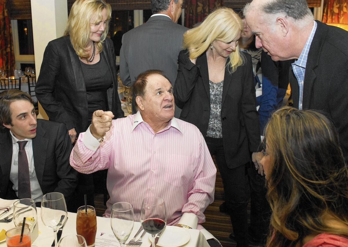 Pete Rose, center, was the featured speaker for the 12th annual Hot Stove League dinner at The Cannery in Newport Beach on Monday night.