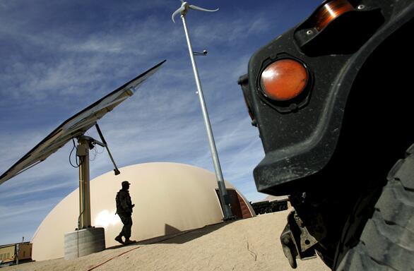 A dome shelter at Ft. Irwin draws power from solar panels and a wind turbine. The Army is experimenting with alternative ways to power the Mojave Desert training area, which replicates austere combat conditions.