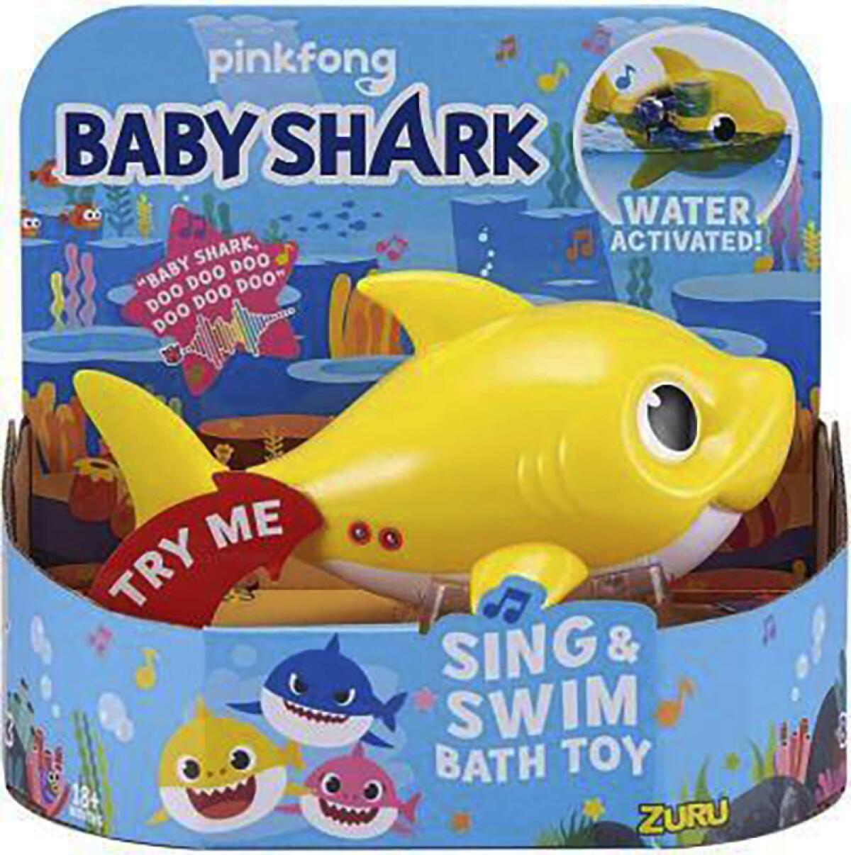 A Baby Shark Sing & Swim Bath Toy in its retail packaging